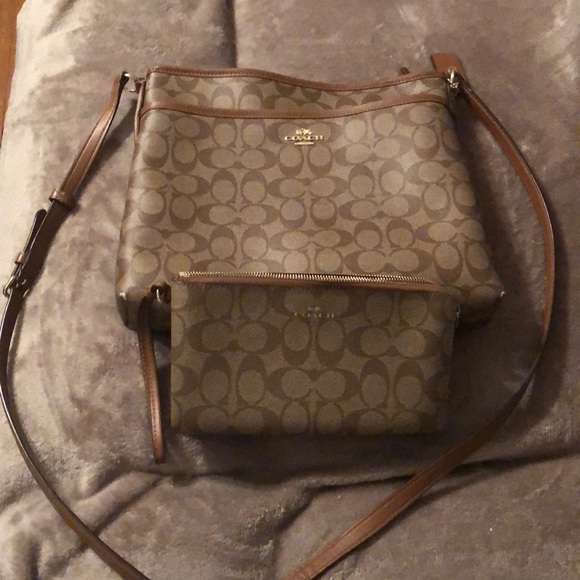 Coach Handbags - A cross body bag from coach with a wristlet.